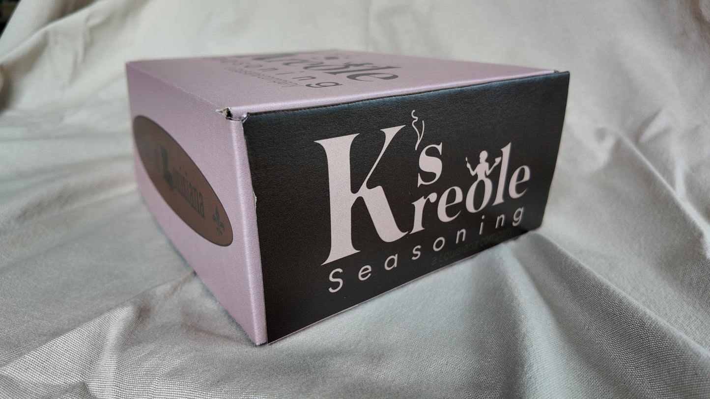 K's Kreole seasoning gift set on a light fabric background