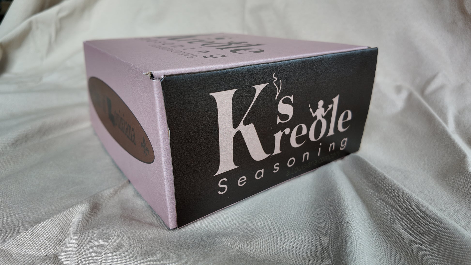 K's Kreole seasoning gift set on a light fabric background