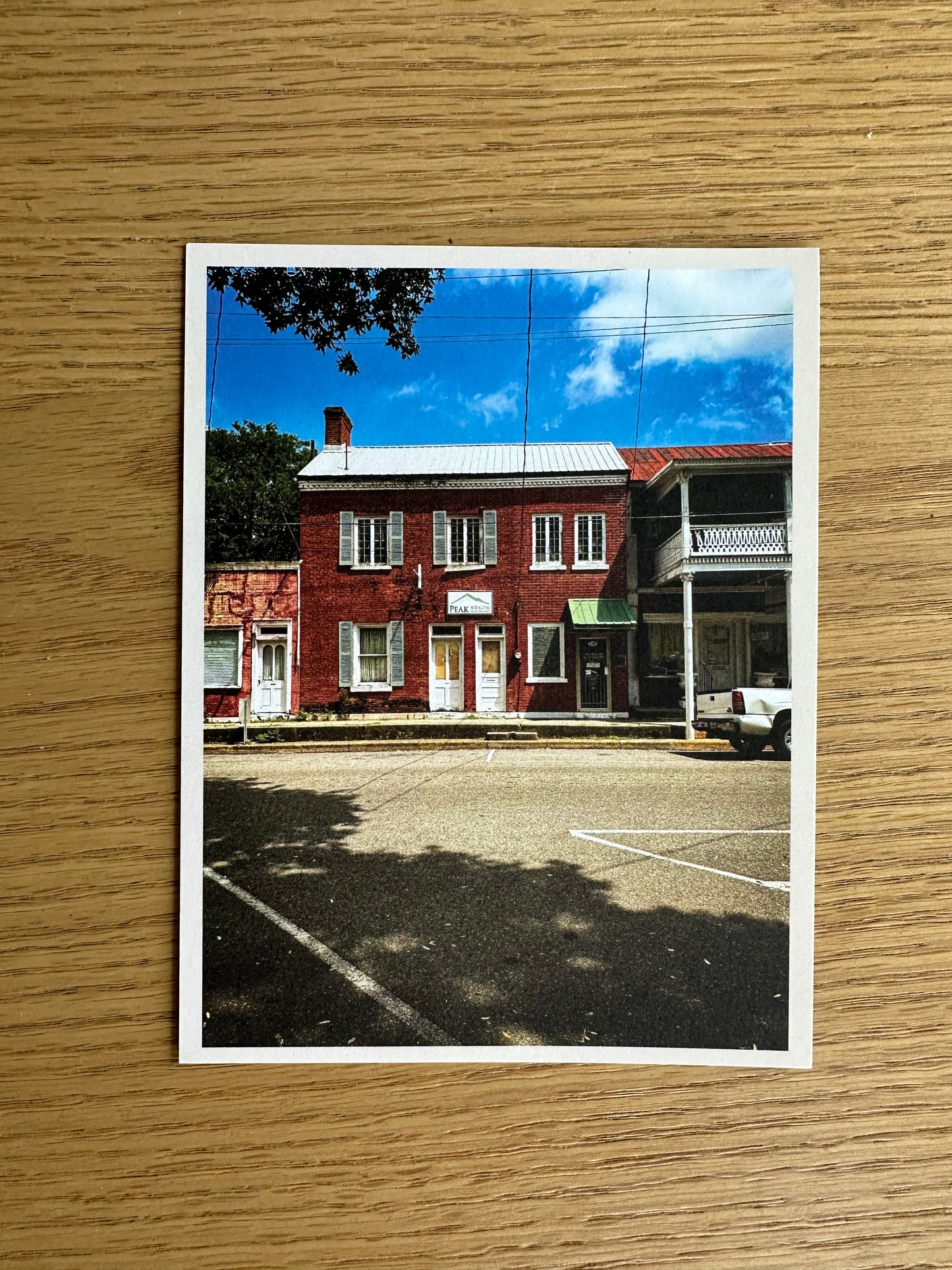 Postcard with a historic red brick building in louisiana