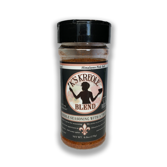 A bottle of K's Kreole Seasoning with a label that includes a fleur-de-lis symbol, text, and the indication that it contains Himalayan Pink Salt.